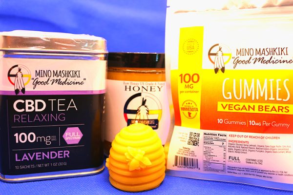 Tea tin, Vegan Bear CBD gummies, honey, beeswax candle
